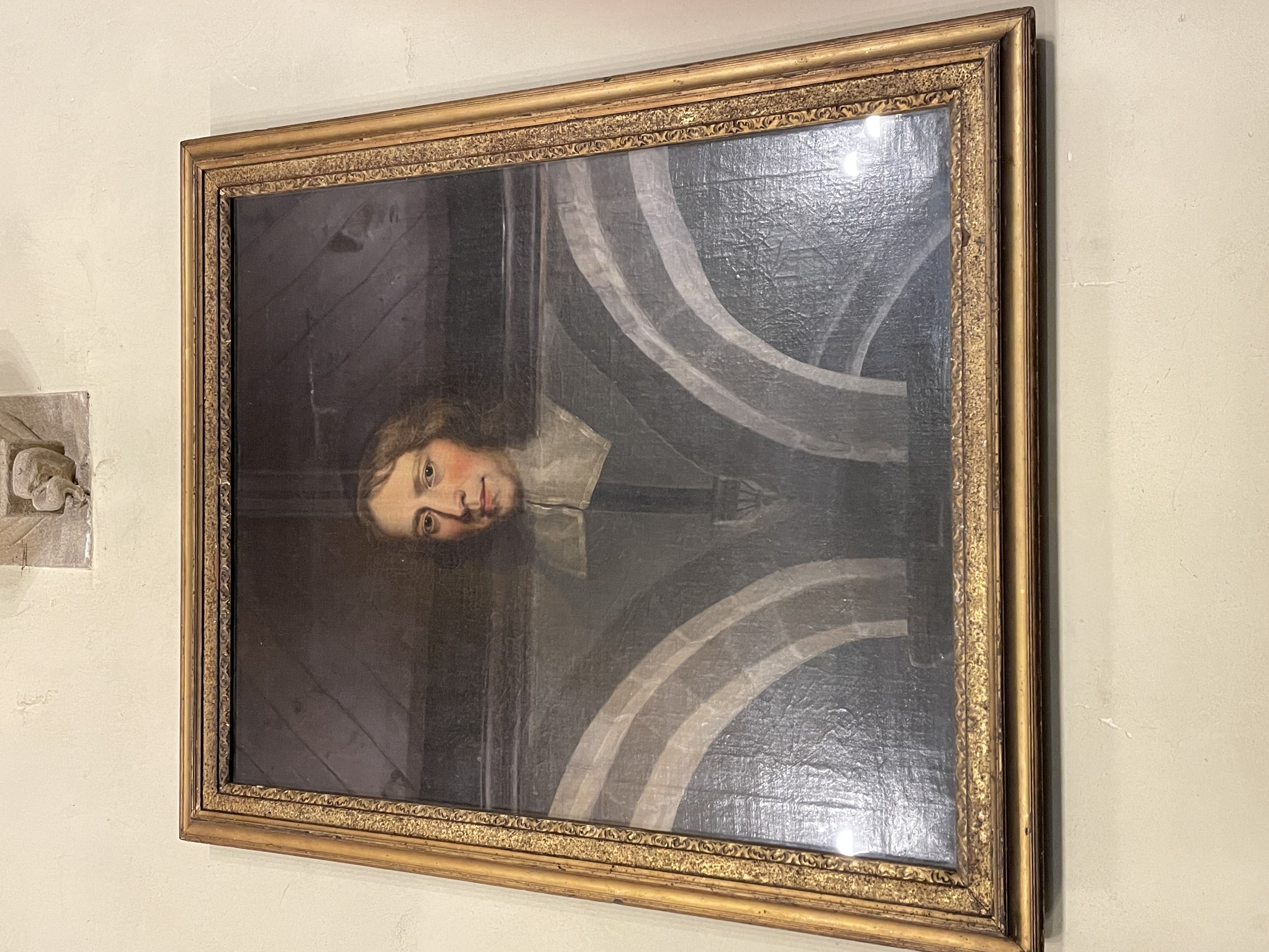 Portrait of Thomas Comber hanging on a wall